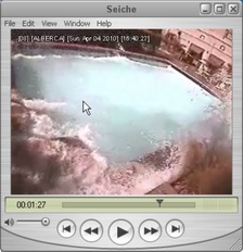 Screenshot of hotel pool with violent waves